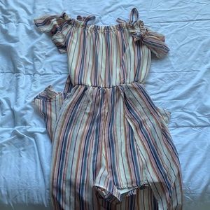 multicolor romper with train